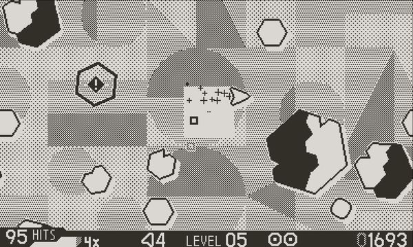 A triangular ship in a field of asteroids